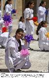 Next picture :: Student looks at the cameraman during the presentation of tableau in a ceremony at OPF School Quetta