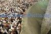 Next picture :: Muslim pilgrim throw pebbles at a stone pillar representing the devil, during the Hajj pilgrimage