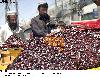 Previous picture :: Customers purchasing dates from a vender for Iftari in Quetta