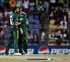Previous picture :: Shahid Afridi is congratulated by Shoaib Malik